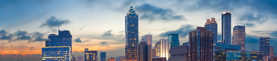 A preemptive amendment was added to Title 34, the Georgia Minimum Wage Law (O.C.G.A. 34-4-3.1), in 2017. The amendment preempts employee benefit mandates outside of an employee’s wage or salary. Atlanta, Georgia skyline.